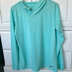 Woman’s Nike long sleeved tee with hood. Size Medium